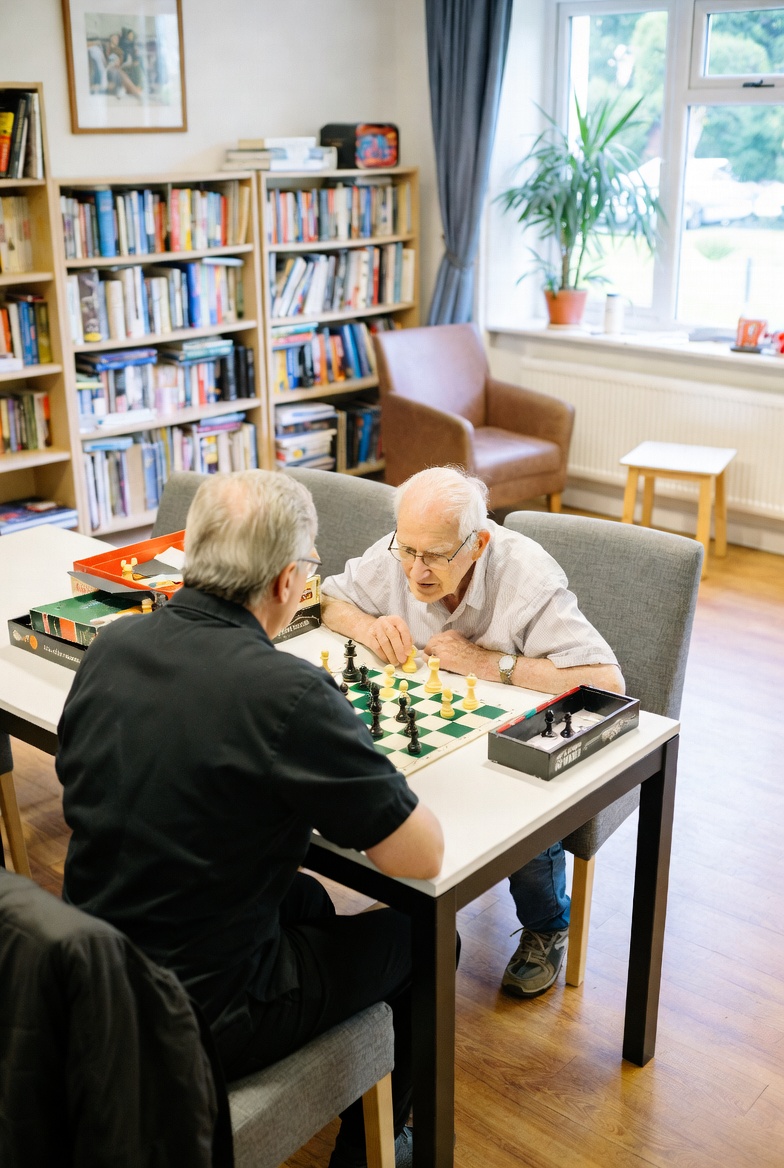 Residents enjoying a game of chess during daily activities